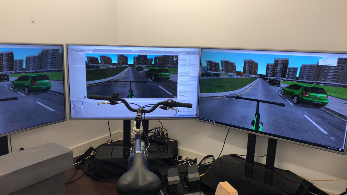SIMUSAFE's tweet photo. The @CovUni_FTC team is busy setting up monitors for the bike simulator. Excited to see the @_ITCL environment on the big screens! #H2020 #simulation #transport #vulnerableusers https://t.co/eGAwzSX1Cv