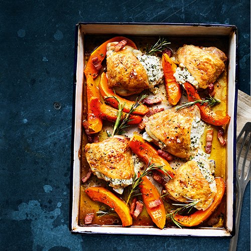 Stuff chicken thighs with herby goats’ cheese and roast with lardons and butternut squash for a deliciously seasonal traybake 🐔🎃bit.ly/2yPrOgZ