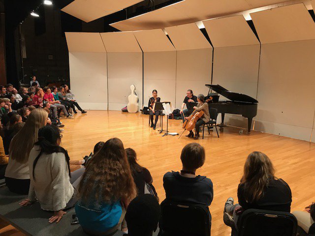 GBPAC's tweet photo. @trioconbriocph1 giving at a talk for the Waterloo West High School string players. Performance this evening at 7pm! https://t.co/M9TWVulmig