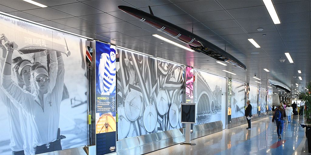 BostonLogan's tweet photo. Can’t make it to @HOCR this year? Experience the race up close with our informational exhibit and racing boats in Terminal B post-security by gates B37-B38. #ExhibitsInBOS https://t.co/cWZ9uGK0HJ