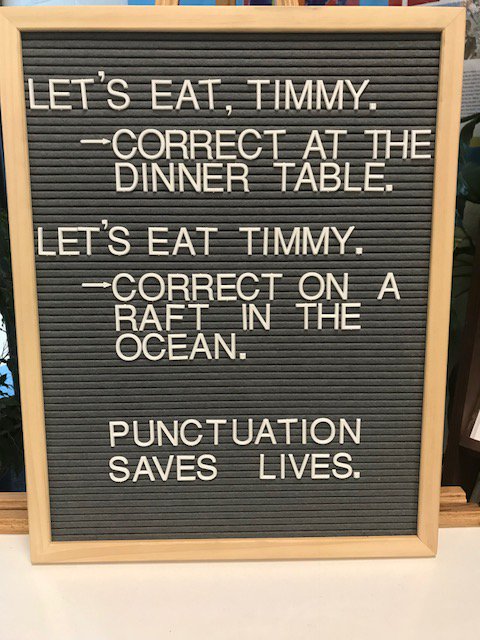 LewistonAdultEd's tweet photo. The Lewiston High School library has a sign near the entrance reminding visitors about the of proper use of punctuation. https://t.co/vvkOeL5sOn