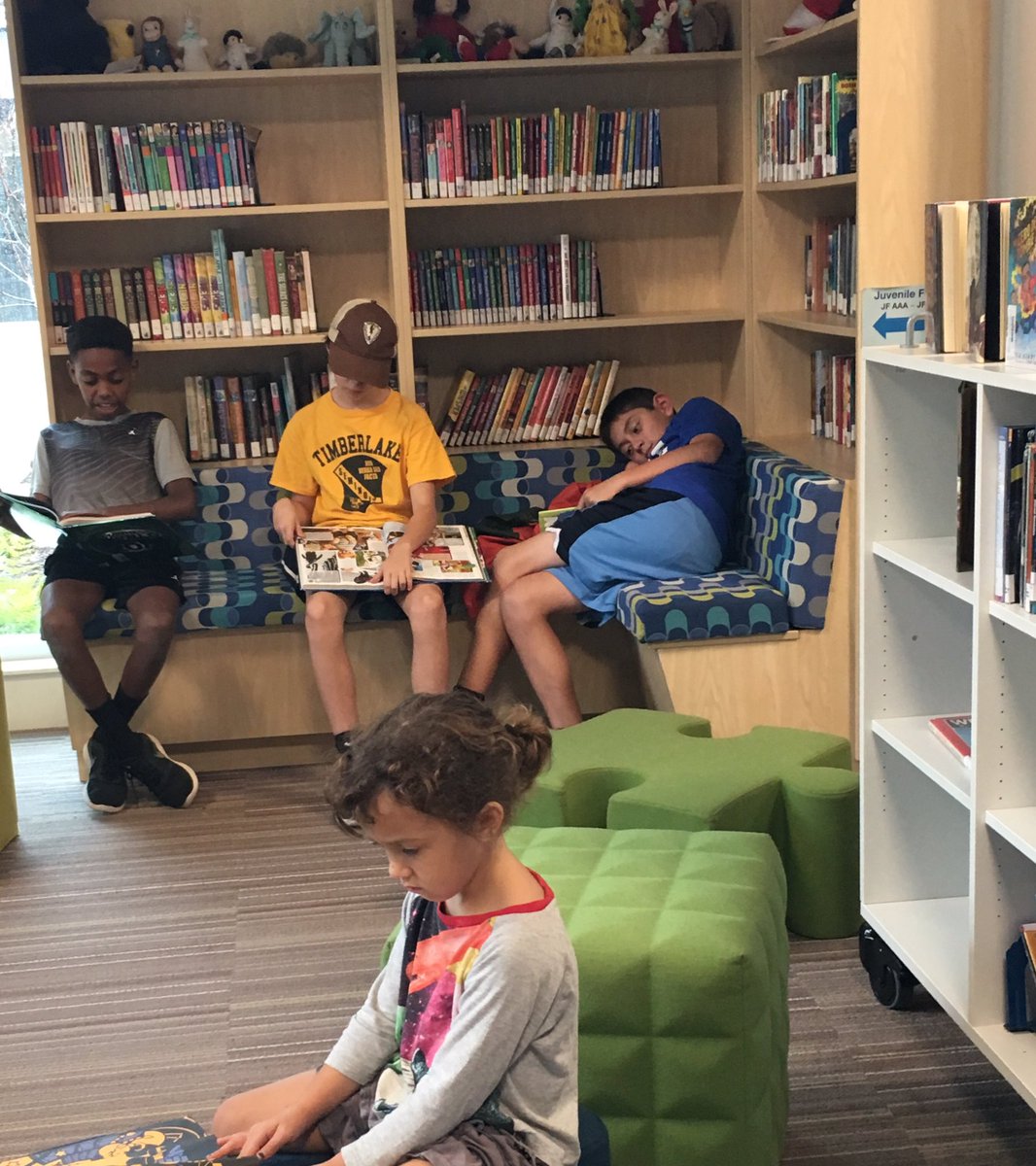 CGreeneCDS's tweet photo. Students of all ages share their love for reading in the Oreck Library.  #cdslearns @carolinaday https://t.co/VFjm9E475Q