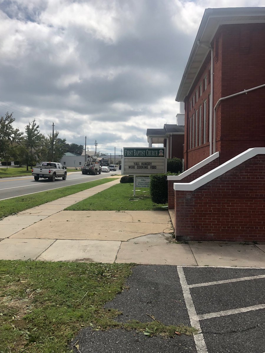 DavidBurtonEv's tweet photo. Defeating hurricane Matthew aftermath. Sign in front of First Baptist Church, Bonifay, Florida. (Hwy79) City power is out. Local grocery stores donating food to cook at the church to feed the community. This is true Christianity at work. https://t.co/he7IS6rKim