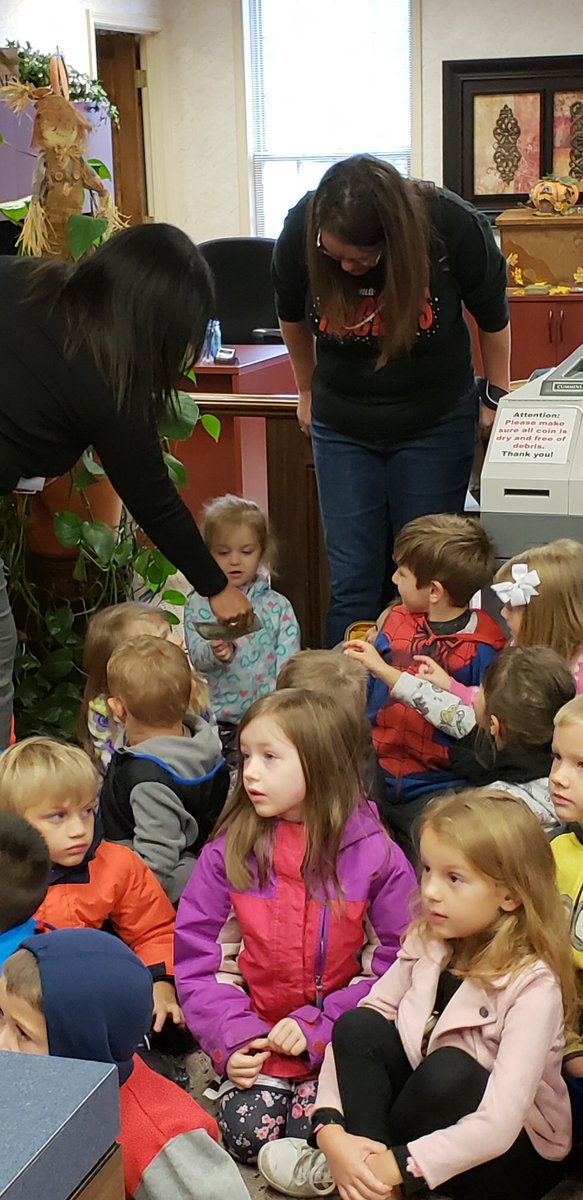 CarlenaSheeran's tweet photo. The @RineyvilleE preschool classrooms of @HCSJArnold &amp; @Ruthann08834785 also toured the Rineyville @TheCecilianBank on their walking field trip today! 🏦 They learned about money &amp; what a teller’s duties include. 💰 💵 #HCSPreschool #HCSStrongerTogether #CommunityHelpersUnit https://t.co/Ge1YsoPFYy