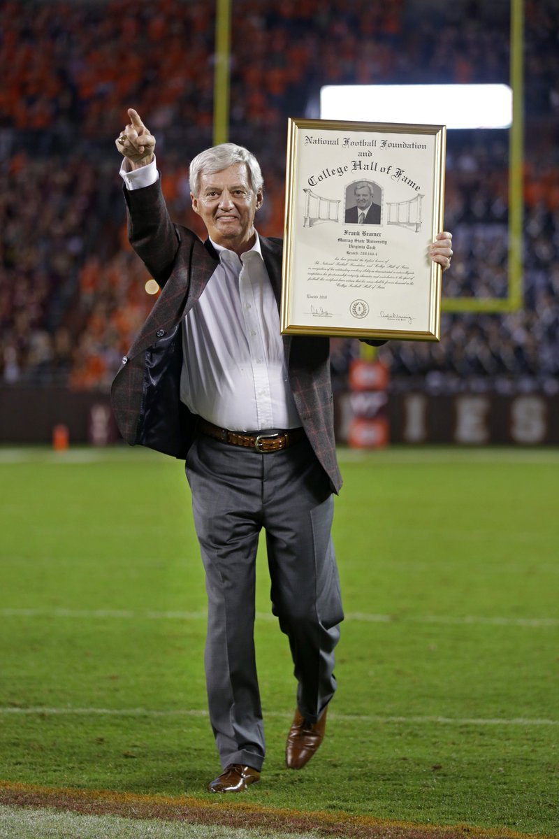 virginia_tech's tweet photo. ICYMI: Last weekend, #HokieNation celebrated Frank Beamer's legacy with a monument unveiling, striped the stadium, and enjoyed a skydiver entrance into Lane. 😲 🎉 🙌 https://t.co/mN4qrbBUQX