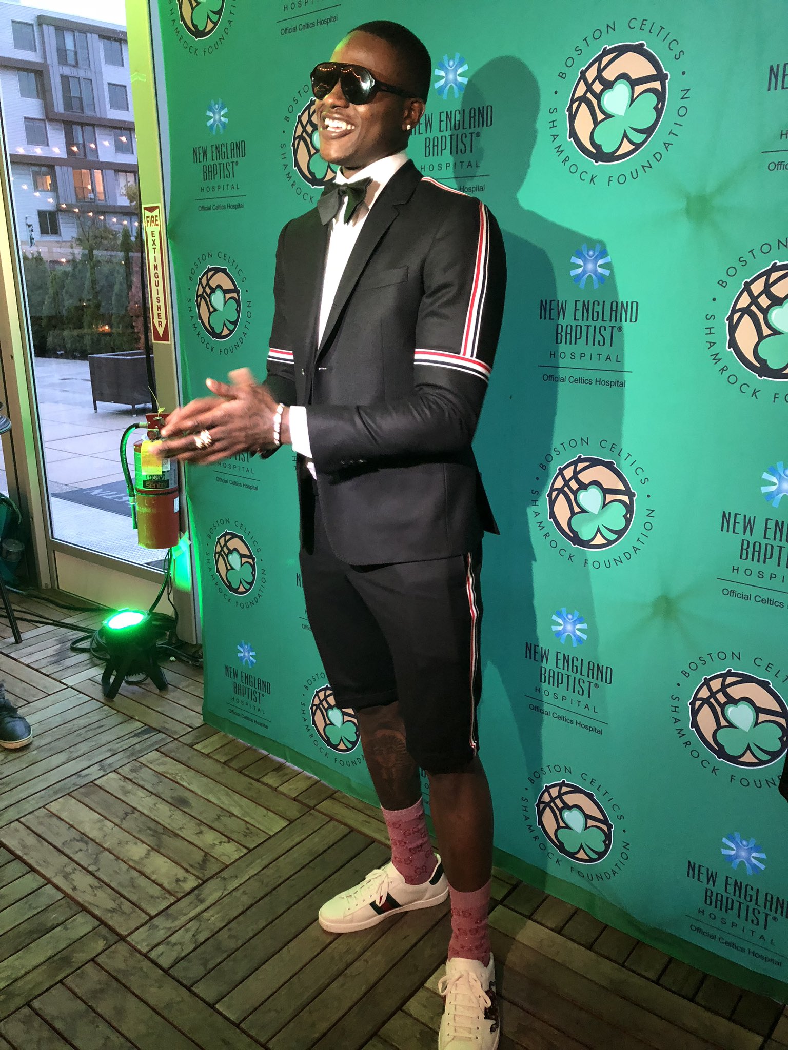 Nicole Yang on X Terry Rozier rocking a shorts suit tonight Gucci glasses Gucci shoes. https t 5TrKhsuHAo X