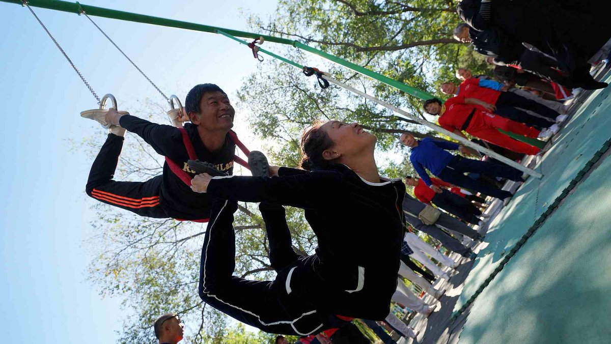 CGTNOfficial's tweet image. Chinese seniors show off gymnastic stunts at "Elderly Olympics Games"