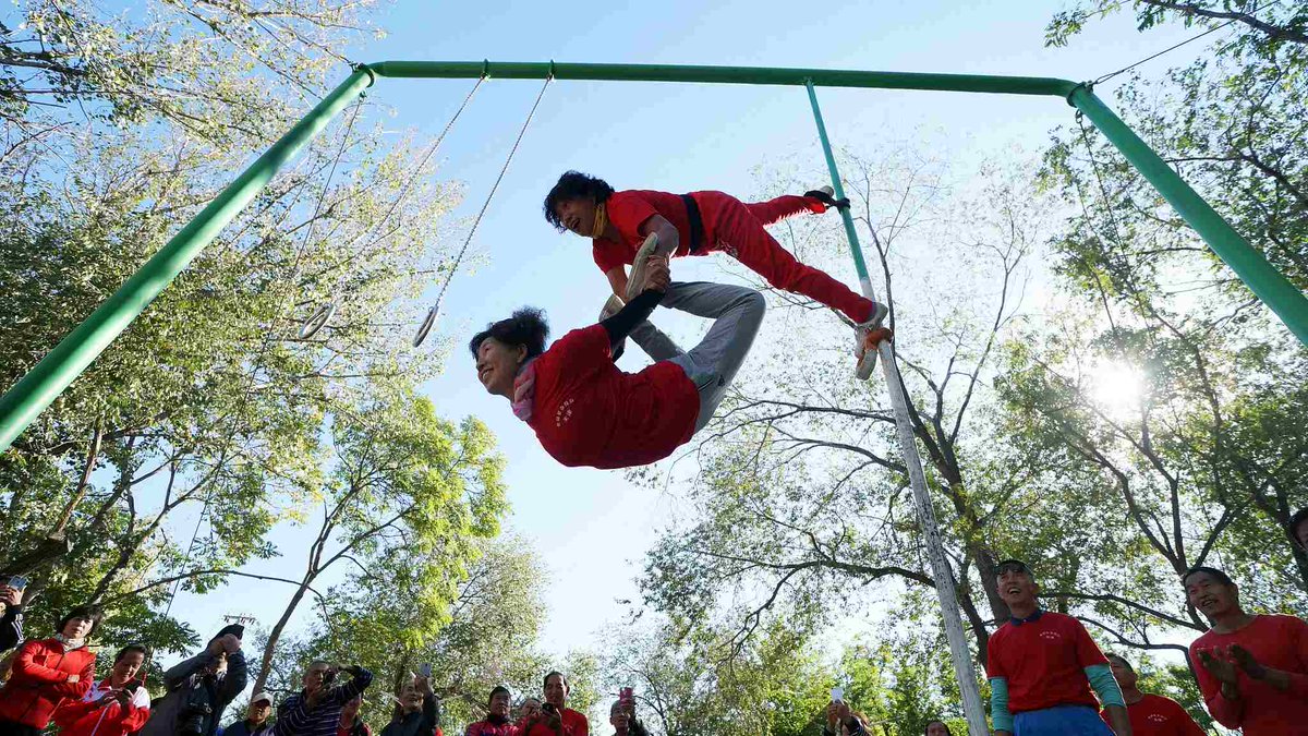 CGTNOfficial's tweet image. Chinese seniors show off gymnastic stunts at "Elderly Olympics Games"