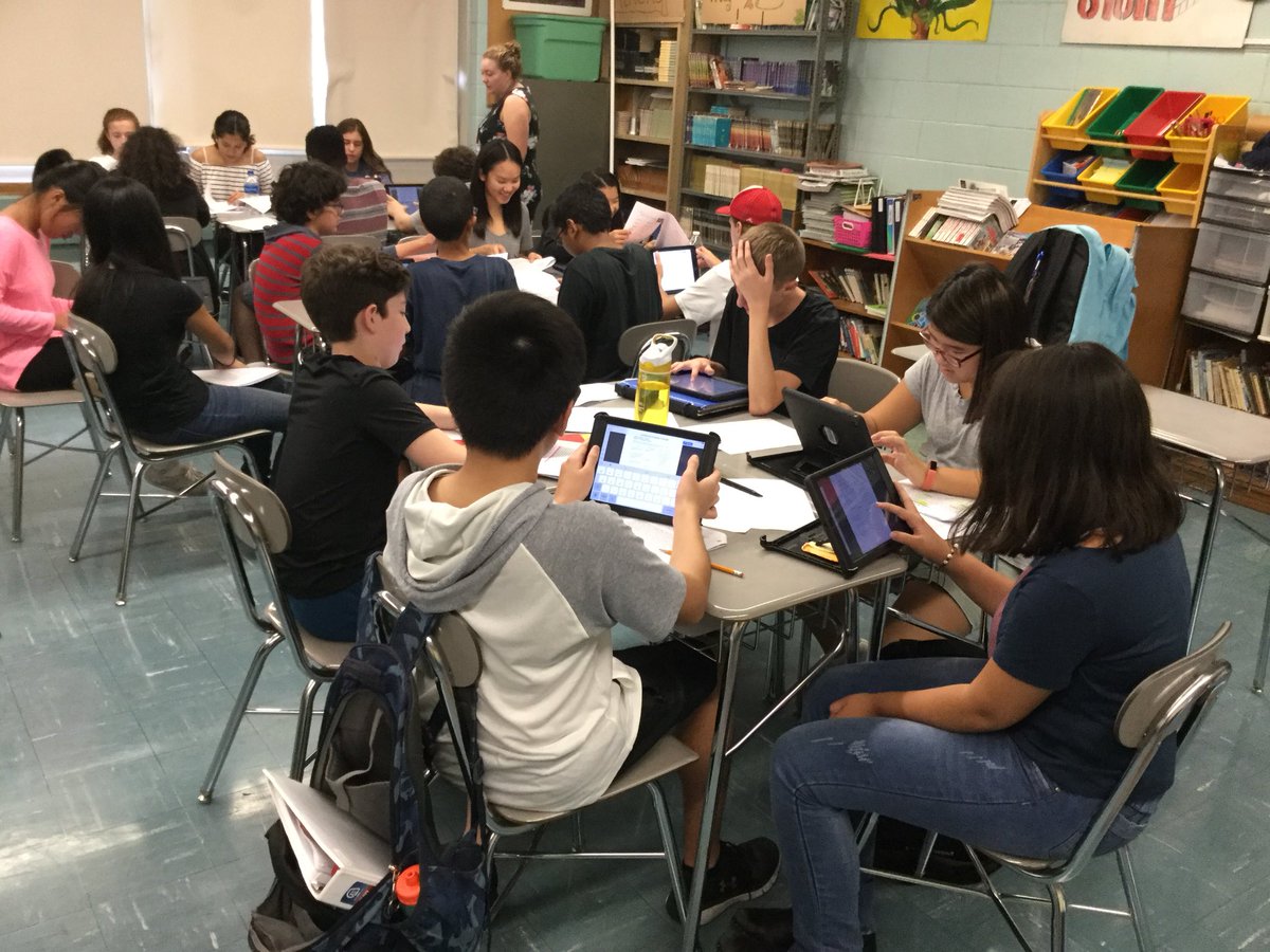 dsmithela's tweet photo. After reading Poe’s “The Black Cat” students analyze the story in class while Ms. Oliveri works with a group rehearsing to perform a pivotal scene for the class. https://t.co/zO3NO1z2A1