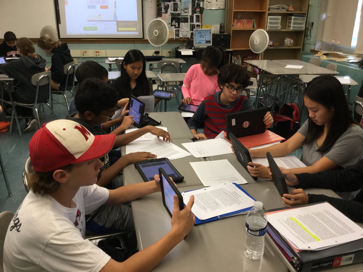 dsmithela's tweet photo. After reading Poe’s “The Black Cat” students analyze the story in class while Ms. Oliveri works with a group rehearsing to perform a pivotal scene for the class. https://t.co/zO3NO1z2A1