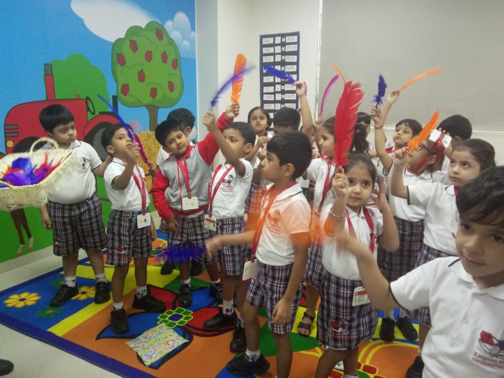 BHISAndheri's tweet photo. It was delightful to see our Gr4 students meticulously teach the tiny tots through PPTs and charts. They vividly discussed various species of birds and spoke about the bird body parts, as well & were given colourful feathers as a takeaway. #CollaborativeClass. https://t.co/CLI3lmXRjc