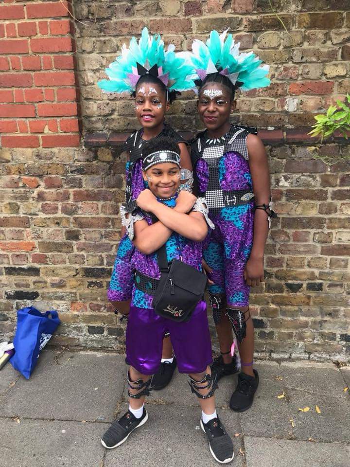 FlagzMas's tweet photo. They striking a pose before they headed off on the carnival route at Notting Hill Carnival Sunday. #JuniorFlagzMasBand #Fun #Smiles #LoveSoca #Vibes #Flagzfamily https://t.co/eTgabNoV6z
