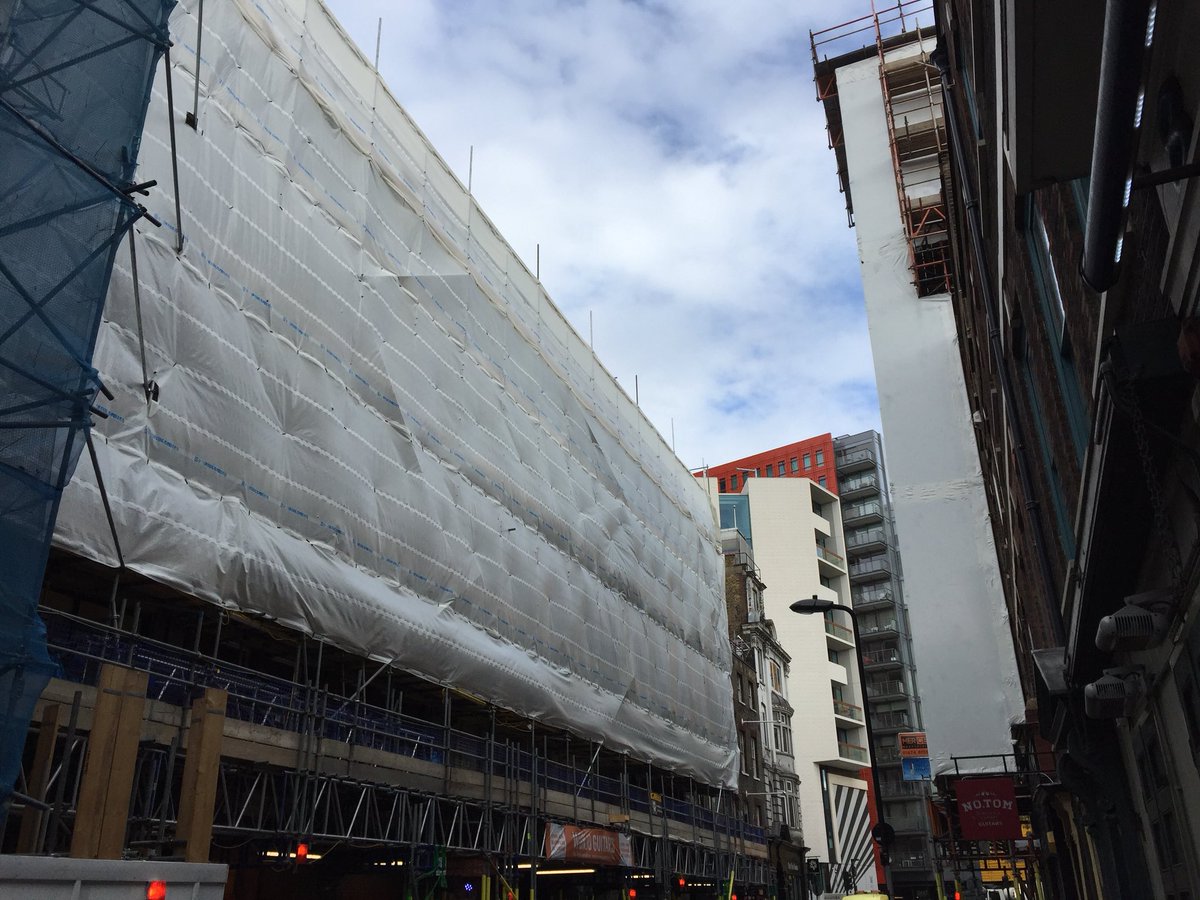 AdamScovell's tweet image. Denmark Street is, to coin a phrase, absolutely fucked. Lots of closed shops and a massive new development between the end cafe and St. Giles in the Field, nevermind the finished horror at the end of the road #SaveSoho