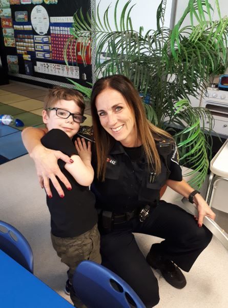 JoinAbbyPD's tweet photo. How does it get better than this!  Meet Cst Dixon (one of our youth officers) and 5 yr old Max from Prince Charles Elementary bringing it in to spread a bit of sunshine! No better job! #JoinAbbyPD #MakeADifference @AbbotsfordSD https://t.co/AHVjV8e0SH