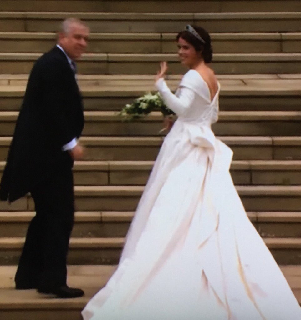 Webrides's tweet photo. Fit for a Princess! 👑 Princess Eugenie is wearing a stunning dress with a lower back and long train. #PrincessEugenie #royalwedding https://t.co/jvhNXQb0uz