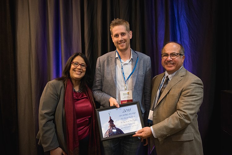 Kansas_Housing's tweet photo. Matt Gillam accepted the New Housing Development Award on behalf of @ovpgroup. The Reserves at Trail Ridge community in Great Bend is the first apartment complex built in the area in over two decades geared toward median income families. #KHC2018 @GBCoC @exploregbks https://t.co/lfyGMbXdOj