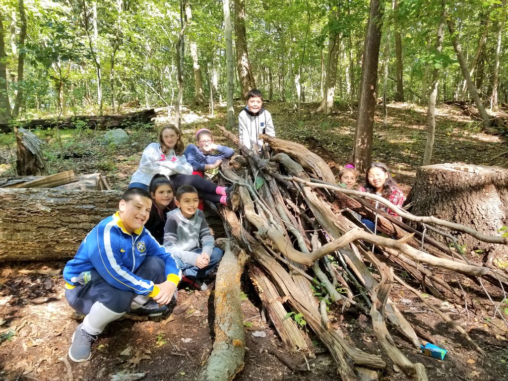 Can you build a shelter in the woods? We can! <a href="/JFK_Bethpage/">JFK Middle School</a>