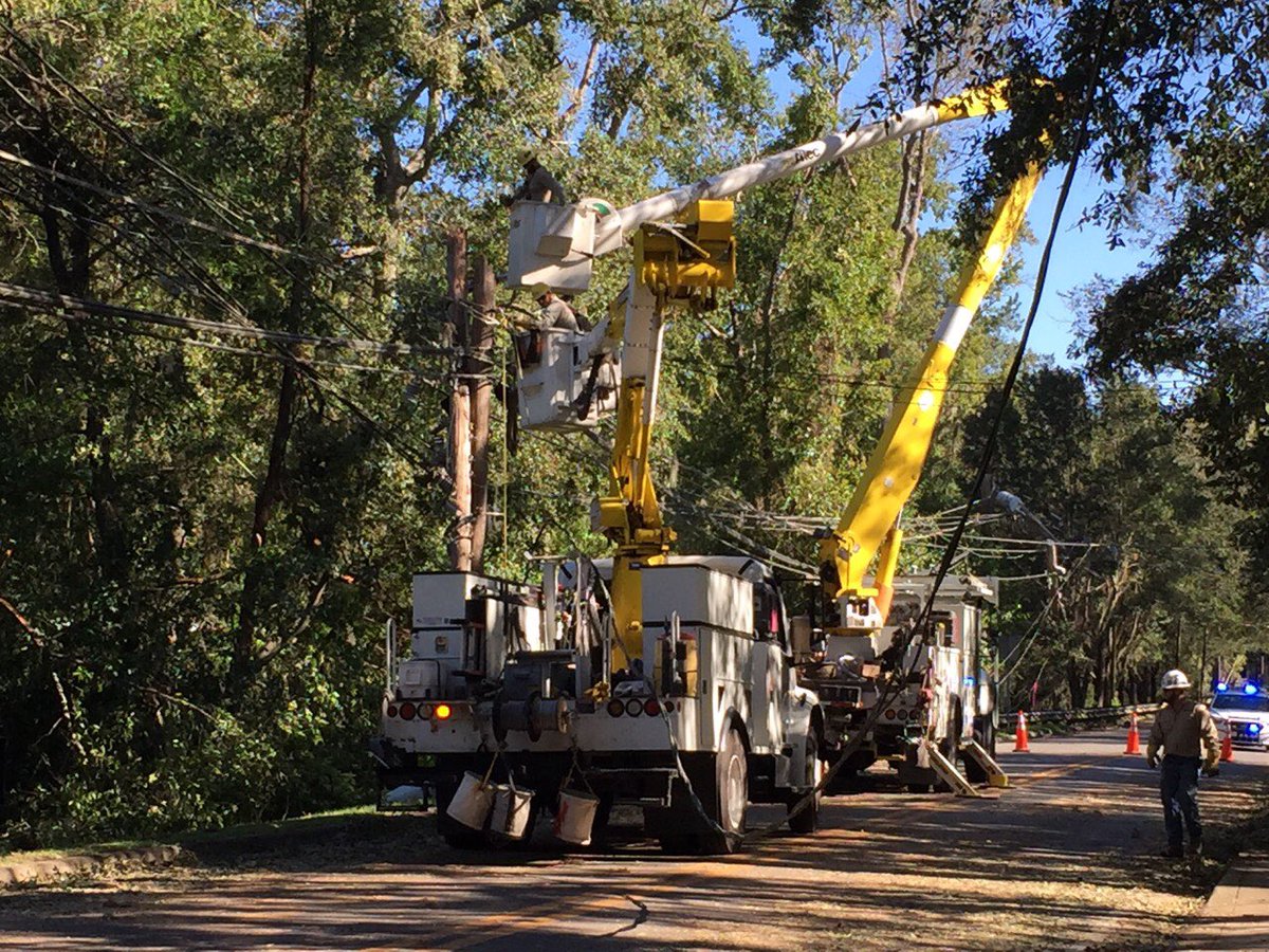 CityofTLH's tweet photo. Lakeland Electric crews working along Centerville. Thx @mylkldelectric! #MutualAid #MichaelTLH https://t.co/FOnTwj6TPc