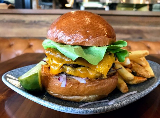 StarTribune's tweet photo. It's Burger Friday: An in-house butcher shop makes all the difference in this memorable burger at the Hewing Hotel's Tullibee. https://t.co/nxb2VqPwZ3 https://t.co/ld3d0HlIVE