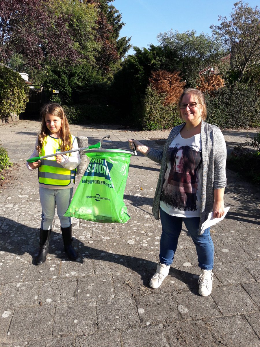 In actie tegen zwerfafval op de Dag van de Duurzaamheid met Let's do it kids!