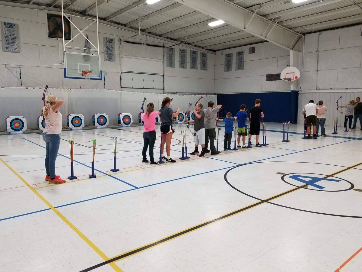naspschools's tweet photo. You know November is near when you see scenes like this at school! Great picture of St Andrew Academy archery team gearing up for the season. Is that Coach Raymer working with an archer? #archery #nasp #kynasp https://t.co/IQc2cPtu47