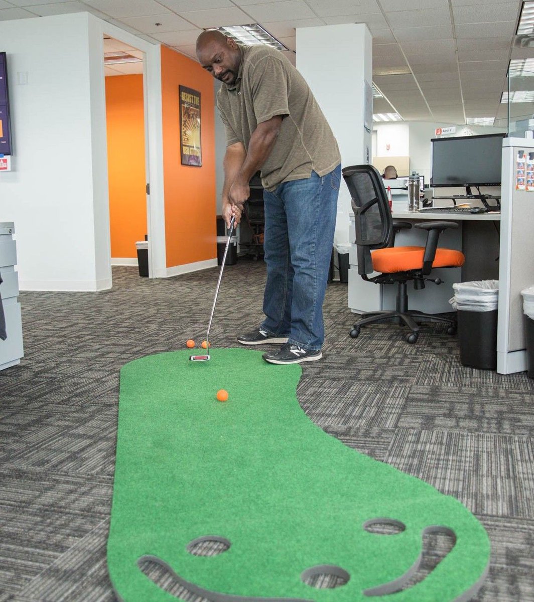 KB4People's tweet photo. Feel like golfing but you are stuck at work? No problem. #golfatwork #florida #golf #floridagolf #puttinggreen #workhardplayhard #companyculture #kb4people #knowsters https://t.co/ZAz8mbvRPK
