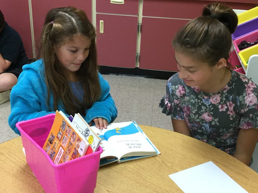 NHWBarry's tweet photo. Yesterday we had special visitors in our classroom! We read to a 6th grade buddy (or two) from @NHWgrade6. These 6th graders were my first group of 1st graders! #allgrownup 😭 https://t.co/hQ8Py6WGkl