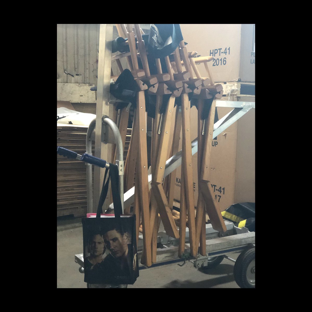 On set, on location on our show <a href="/cw_supernatural/">cw_supernatural</a> cast and director chairs waiting to be set up. What seems out of place but still very much apart of the show? 
*
*
#funny #Supernatural