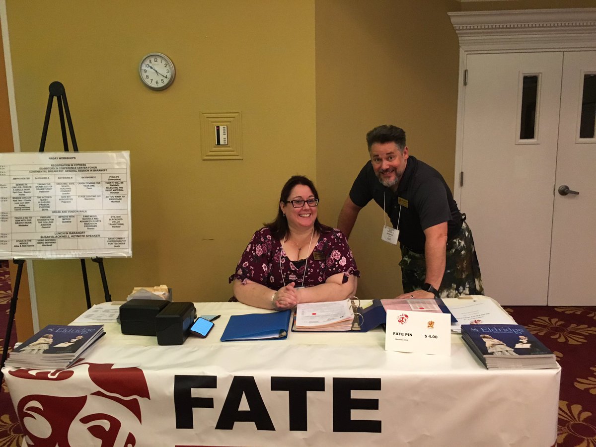 FATEFL's tweet photo. Kristen and Randall working hard at the registration table! #fate2018 https://t.co/rBQ1WRhpdh