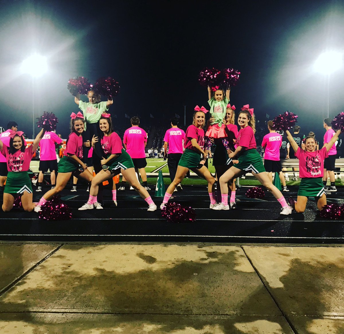 We are having so much fun with Emma Rae and McCall tonight! They are the Azle Education Foundation Auction Bid winners 🖤💚 #azleisdway