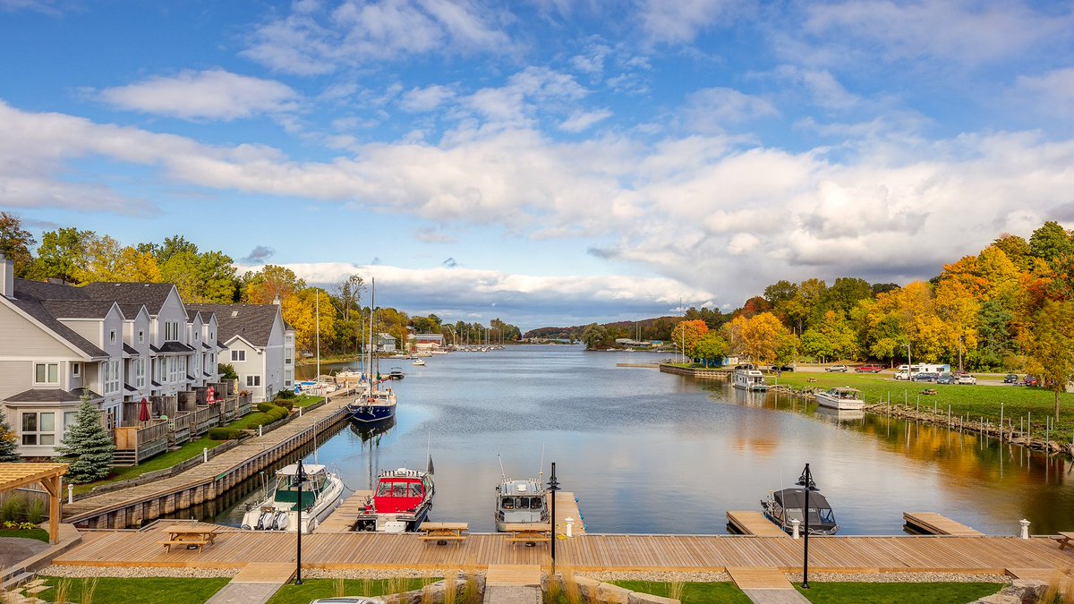 The fall colours are amazing in #PrinceEdwardCounty right now. A view of Picton Harbour from the Picton Harbour Inn. #BayofQuinte #PEC