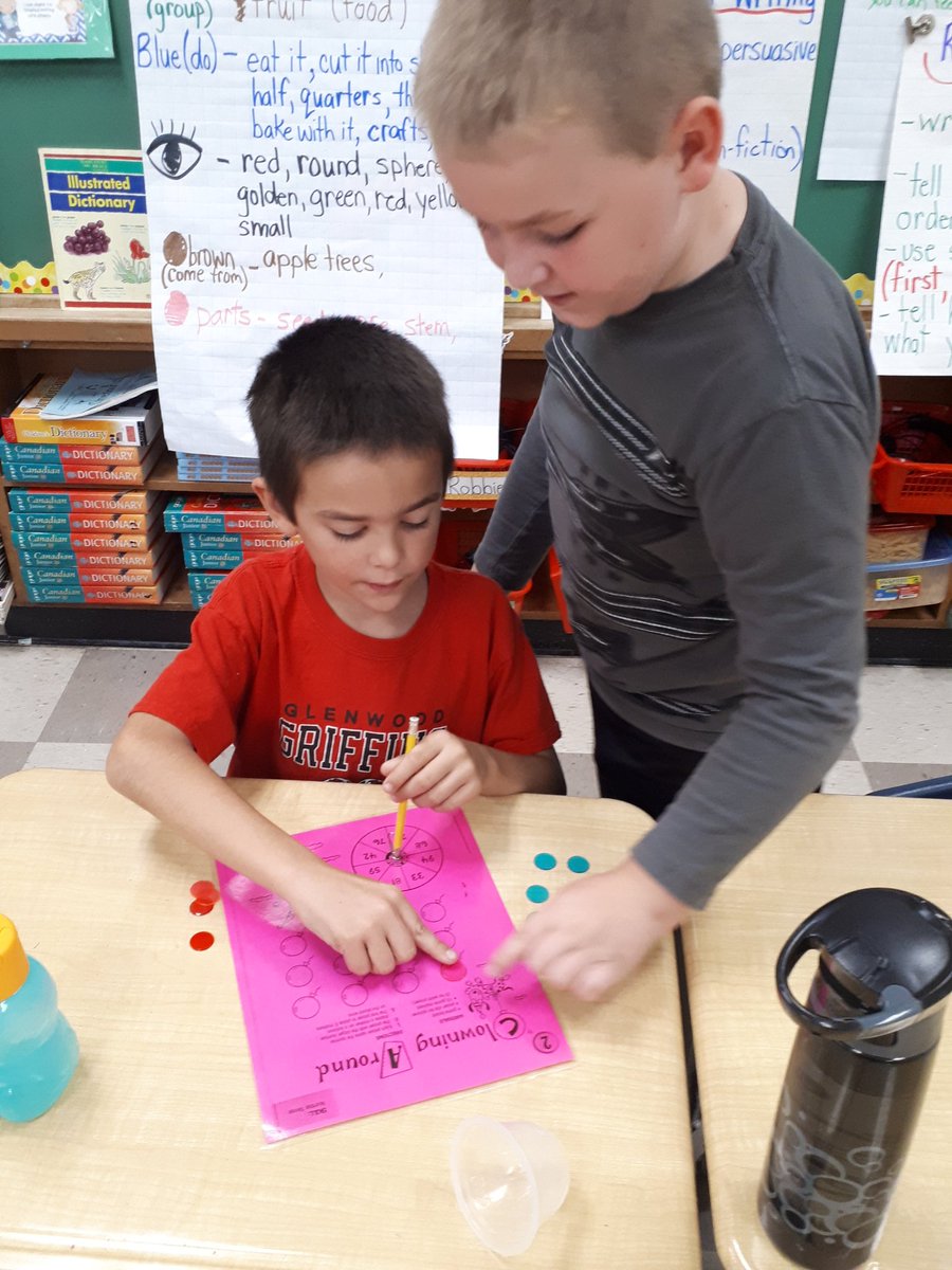 MrsTartesClass2's tweet photo. Math game Friday! Smaller and larger numbers, hundreds chart and collaboration all rolled into one 35 minute period.  #numbersense #2digit Sts enjoyed the chance to choose their own partners - Gr 3s with 2s! @GlenwoodGriffin @mrsawendr https://t.co/kwC0fJOlWd