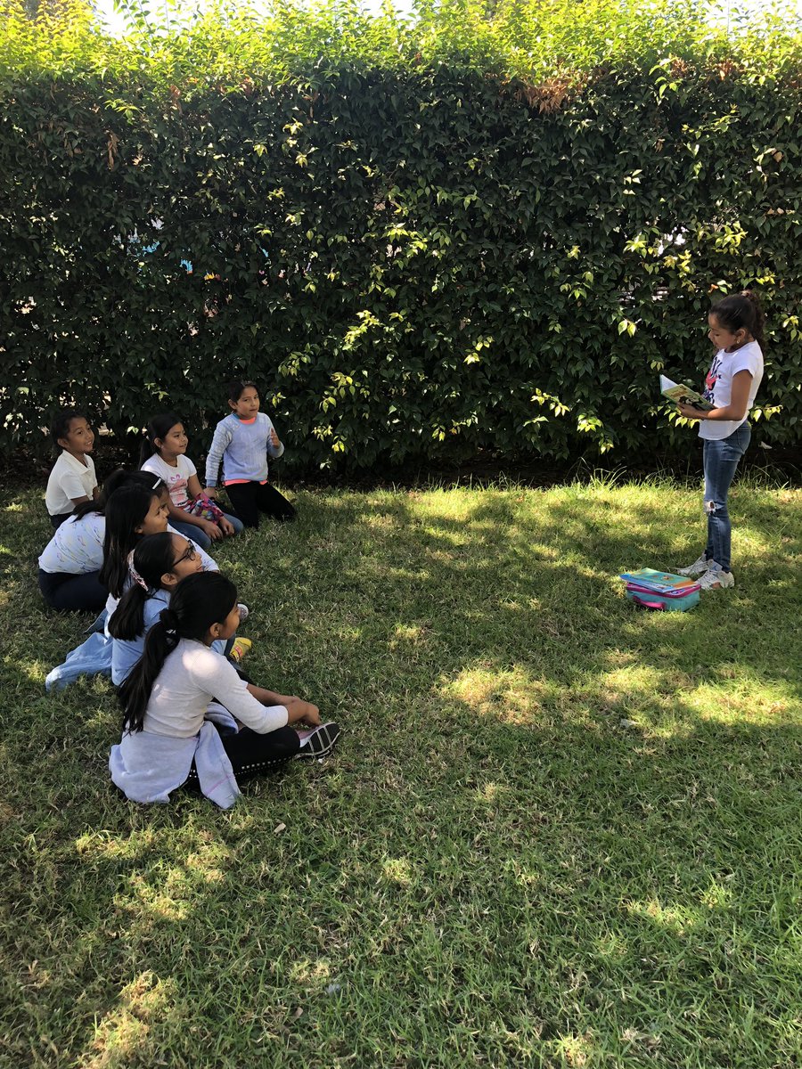 What a beautiful sight! Our teachers have recently received Interactive Read Aloud trainings and it looks like it has reached the students! #readaloud #readinggarden #parmeleepride