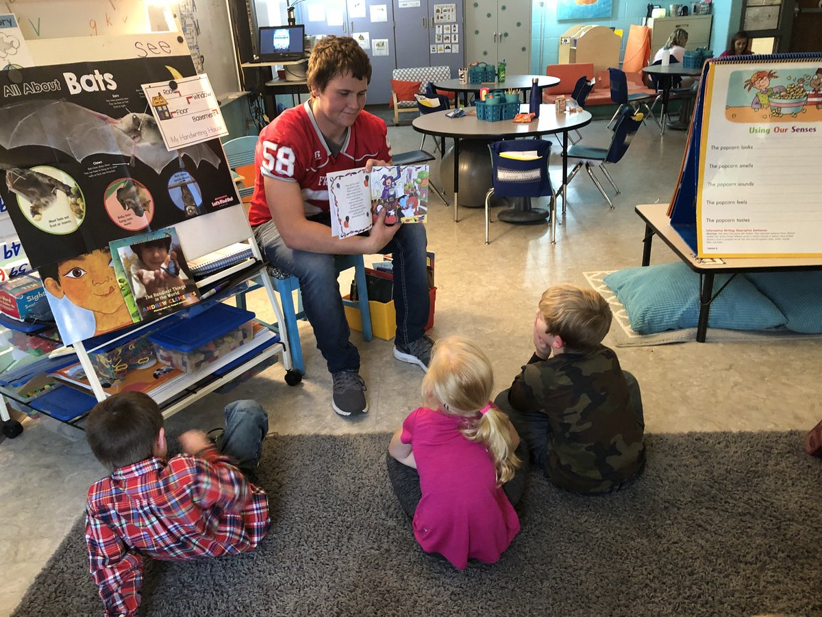 fgskindergarten's tweet photo. Thanks Brian for being our wildcat reader today. They loved your answers to their questions but most of all they loved sitting on your lap.  Proud of you tonight. 
#wildcatway 
#champs
#❤️🏈 https://t.co/2ARHX6OkE0