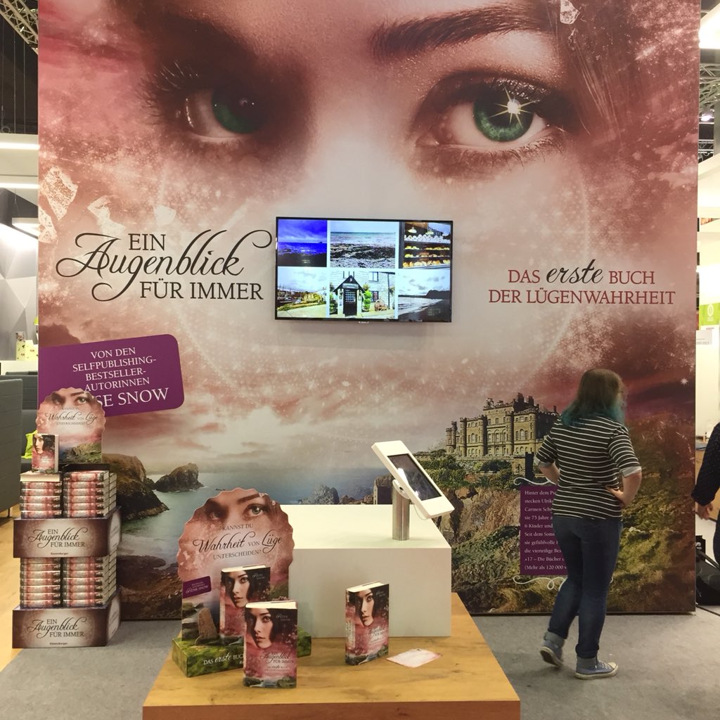 hertnon's tweet photo. Frankfurt Bookfair #fbm18 blowing my mind. Publishing isn’t struggling, it’s developing. German publishing rocks! How about this promotion of a formerly self-published author (actually two authors writing as #rosesnow). A big wow to my #rwnz colleagues! #williamhenryauthor https://t.co/ZiBeSbJGq2