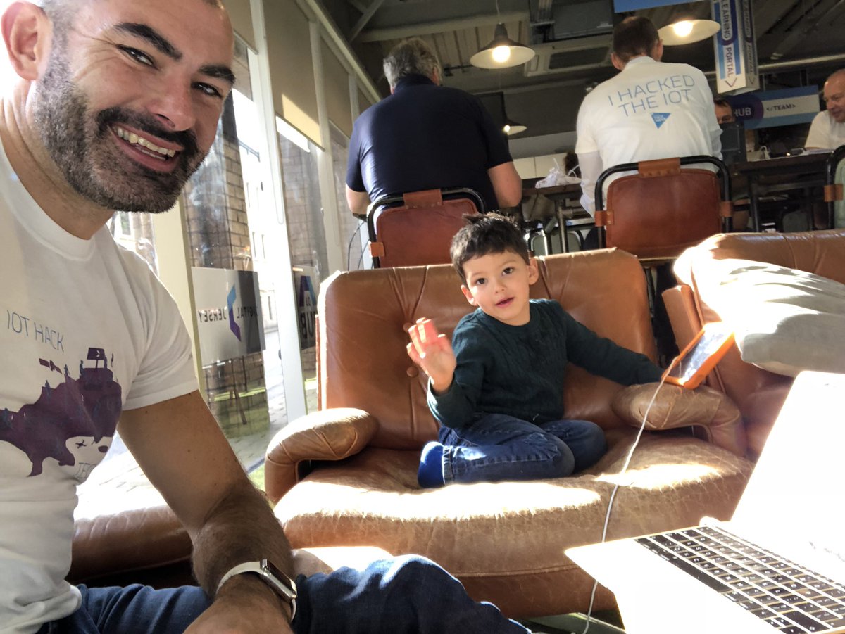 JerseyITGuy's tweet photo. Old #geek and future geek working on separate projects @DigitalJersey #hackjsy event today. Not sure Minecraft is going to win this one but the boy is super focused on it. https://t.co/bTlG4fbRrO