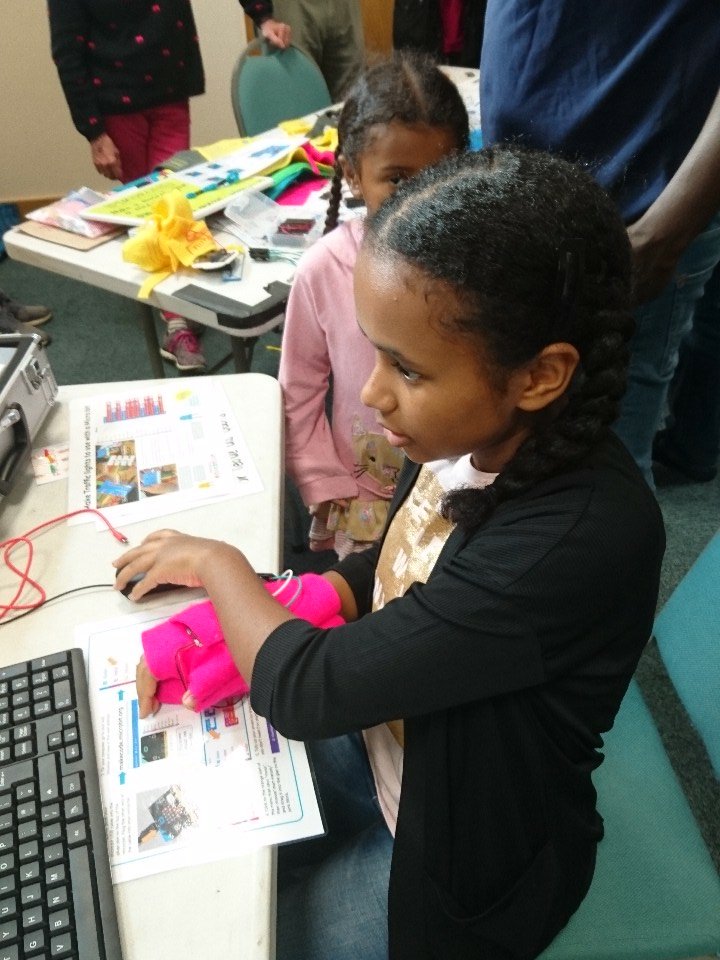 pimoroni's tweet photo. Coding and sewing! Making pre - production musical gloves. @PboroSTEMFest #psf18 https://t.co/j0XYlOvIXk