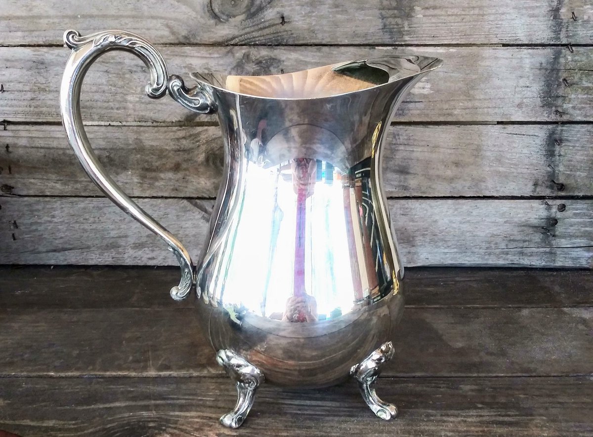 RaggzandRelics's tweet photo. Ornate Leonard silver plated footed water pitcher with whale tail ice spout, perfect wedding gift or holiday entertaining. #thanksgiving #silverplate #waterpitcher #wedding #housewarming #vintage #etsy #etsyfinds #housewares #silver #leonardsilver https://t.co/7ROOS6VkMG https://t.co/2DtRmd5Hcb
