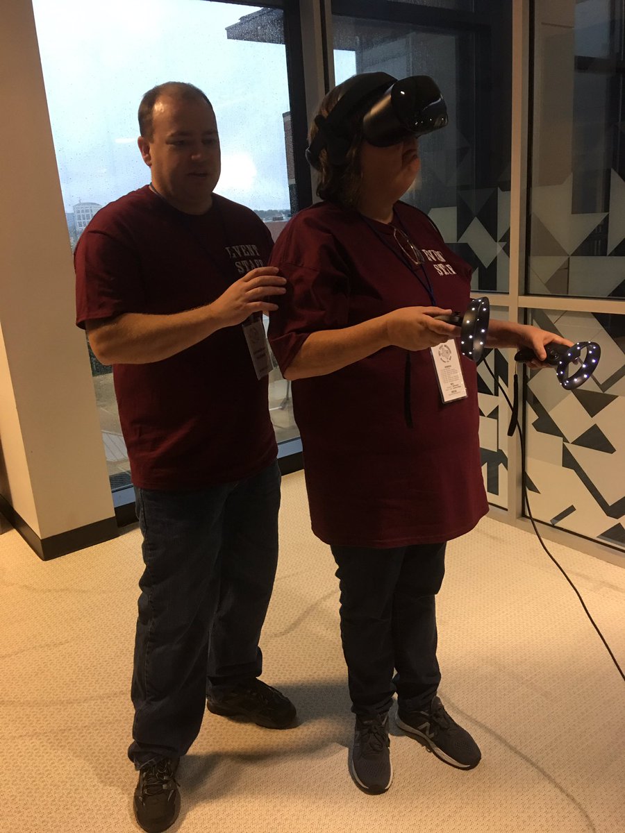 DevFestWeekend's tweet image. Our event staff trying out the mixed reality gear. #DevFestWeekend2018
