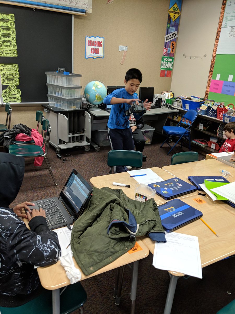 Gilliam2009's tweet image. Friday before break = Robot mission! Motors are no longer communicating to each other. How far is one revolution? How do you get it to move forward? How far do you need to go? #programming #scienceinmath #goingtomars @SFE_3820