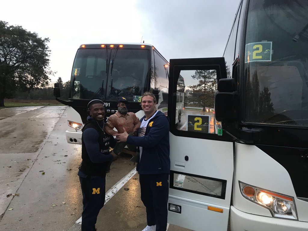 Michigan Football on Twitter "The team stopped to pass the trophy from