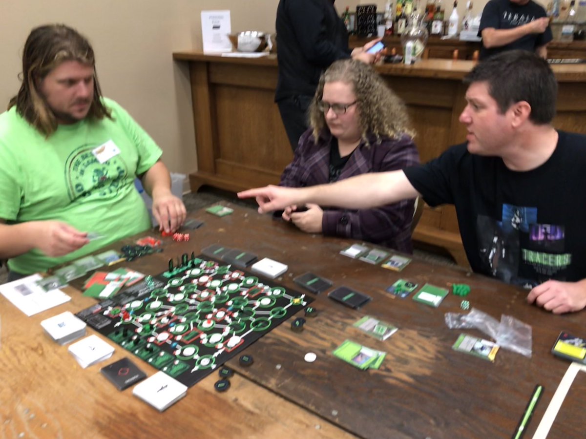 TracersGame's tweet photo. Second game session of the day.  These players were involved in the first public play test over a year ago.  How the game has changed!  Glad to have them try again.  #rockcon2018 #boardgames #convention https://t.co/owF9AF0zQ0