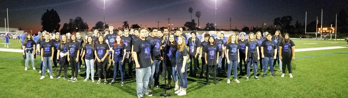 LHHS Choir at the ready to sing the National Anthem at Homecoming.