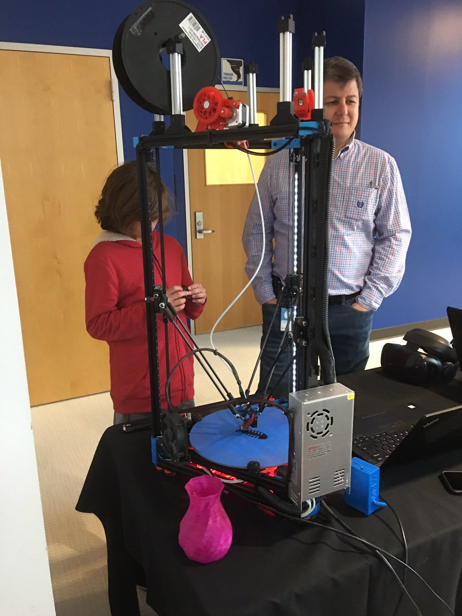 DevFestWeekend's tweet image. Our youngest attendee checking out the 3D printer at #DevFestWeekend2018