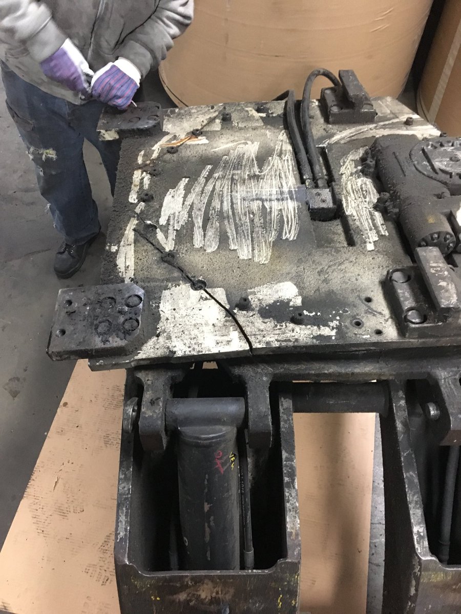 Only a forklift repair man will know what this disaster is. Cascade paper roll clamp mod.77F. WOW.