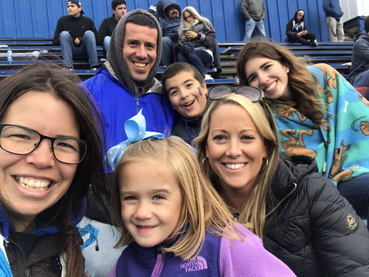 East Providence leaders @Messier_EP and @lnreilly cheering on the Rhody Rams with the family. #weekendfun #rainwontstopus #buildingrelationships