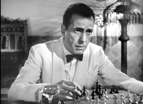 HumphreyBogart's tweet image. Humphrey Bogart was a master-level chess player and U.S. Chess Federation tournament director. He played for money on Coney Island, played a grandmaster to a draw + played soldiers by mail until the FBI intervened. It feared the chess moves were secret codes. #NationalChessDay