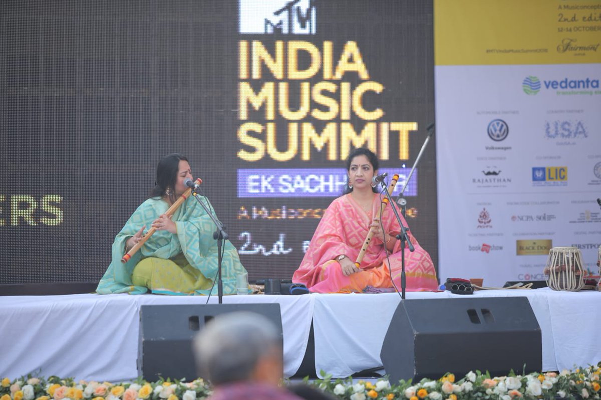 IndMusicSummit's tweet photo. Flute sisters Suchismita  @Suchismitaflute and Debopriya Chatterjee @Debopriya10 captivate the audience with “Blowing in the Wind”, their delightful performance at #MTVIndiaMusicSummit2018, brought to you this morning by @NESCAFEIndia

@TheRaymondLtd
@VisitTheUSA
@volkswagenindia https://t.co/TtL7m947g3