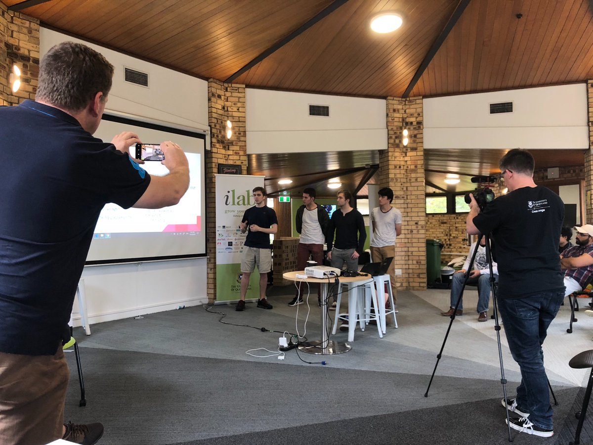 ianmconnor's tweet photo. Next up Rube, well a photo of  @mrkwhite taking a photo of team Rube at @tadhackbne https://t.co/EkHXLEgI6M