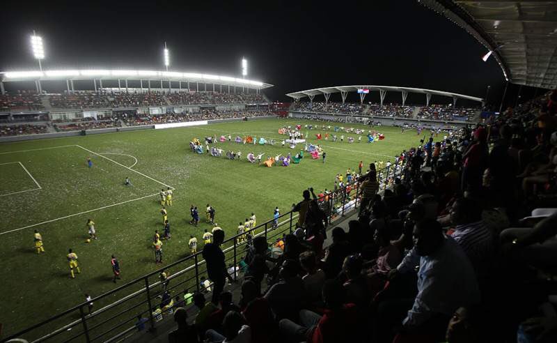 How about the Estádio Maracana in Panama. 5,500 capacity and includes a two tier stand with corporate boxes